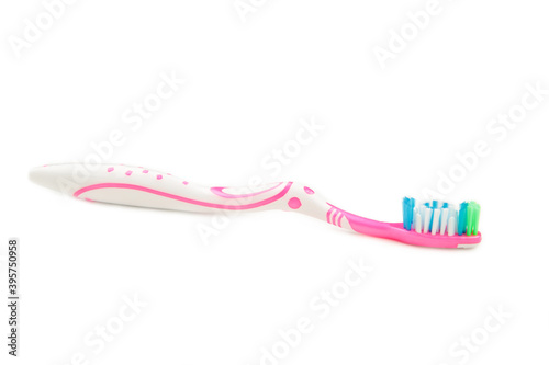 Pink toothbrush isolated on a white background