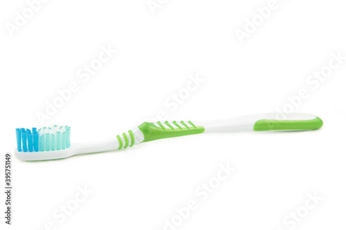 Green toothbrush isolated on a white background