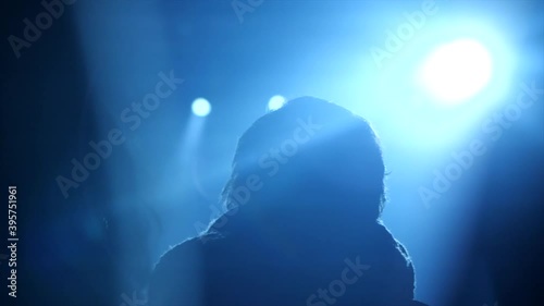 Man dancing at a concert photo