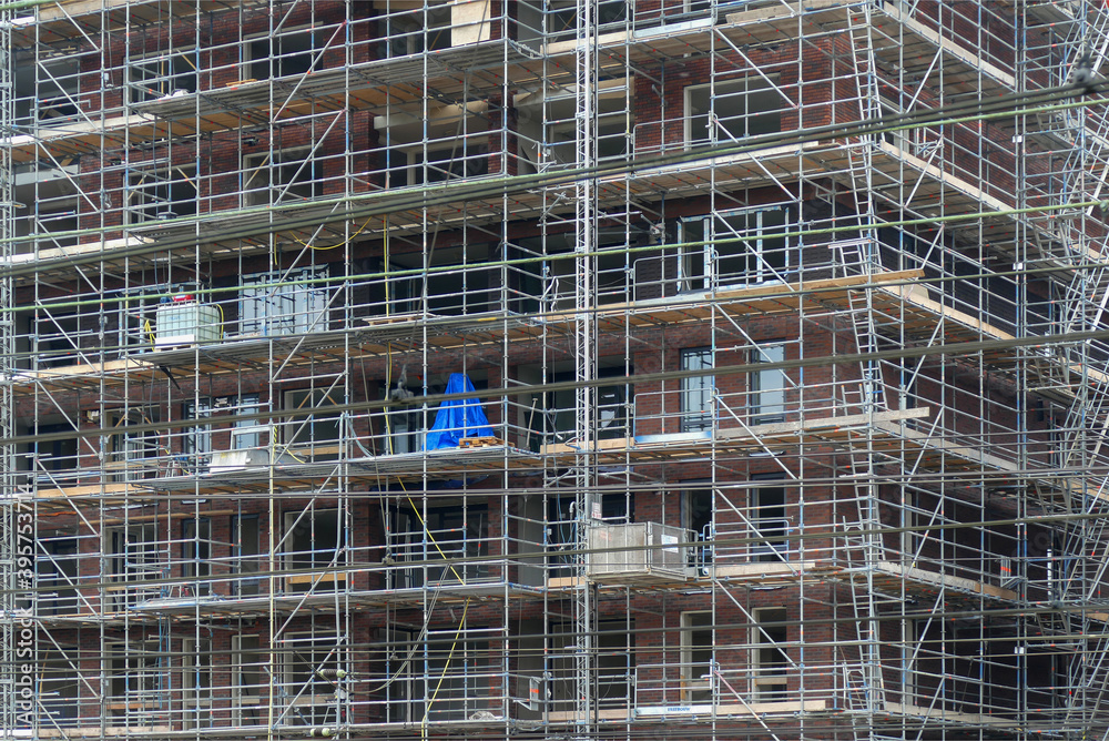 Large scaffold at a construction site in progress
