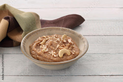 Halwa (Indian Sweet dish) in a ceramic bowl photo