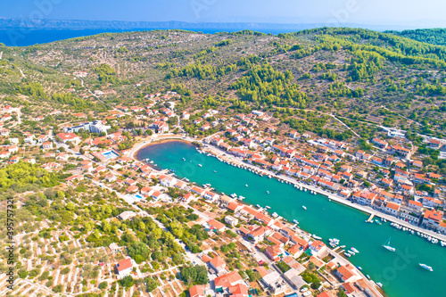 Korcula. Town of Vela Luka on Korcula island waterfront aerial view © xbrchx