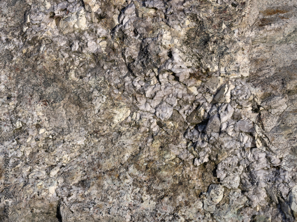 Texture of granite rock with quartz pieces Texture of granite rock with quartz pieces