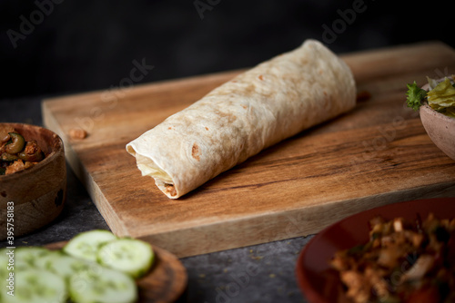 a durum or a burrito on a table