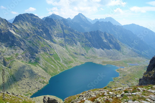 Velke Hincovo pleso, the biggest mountain lake in High Tatras surrounded by Rysy and Koprovsky Stit, Slovakia photo