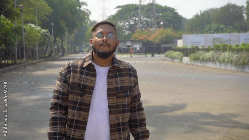 man walking on street in fashionable cloths looking gangster slomotion intence walk man walking on street in fashionable cloths looking gangster slomotion intence walk