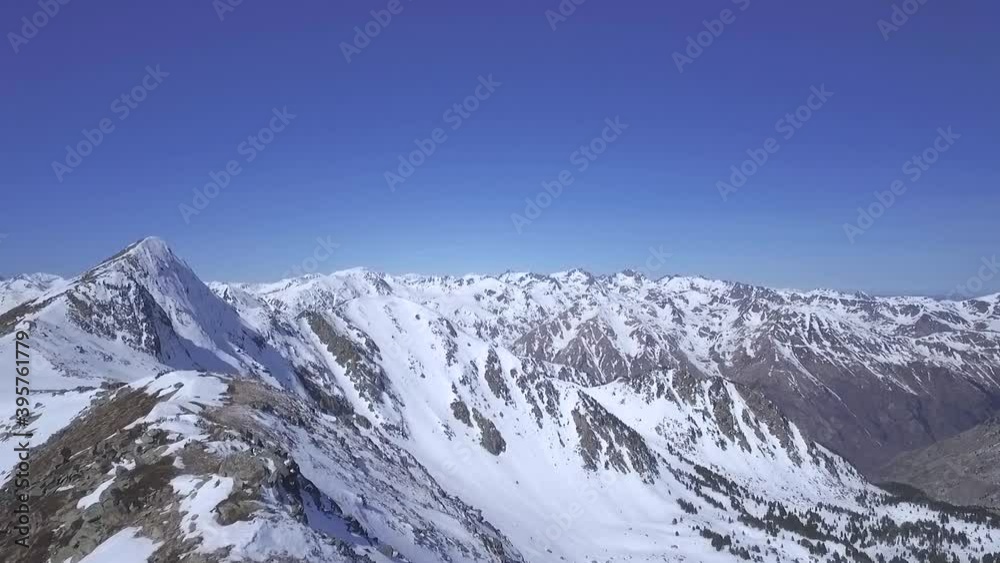 Flying Over Alpine Climber on Snow Convered Mountain Peak, Aerial Flying Over Alpine Climber on Snow Convered Mountain Peak, Aerial