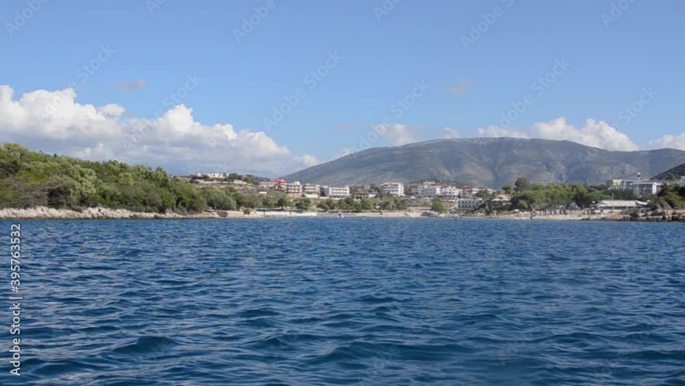 Passenger view from the boat on beautiful blue sea, bay and mountains. Traveling with ferry boat. Cruise ship vacation. Passenger view from the boat on beautiful blue sea, bay and mountains. Traveling with ferry boat. Cruise ship vacation.