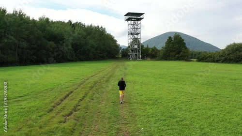 Aerial view of the Zlatnik lookout tower and the athlete in the Slanske vrchy locality near the village of Bystre in Slovakia photo