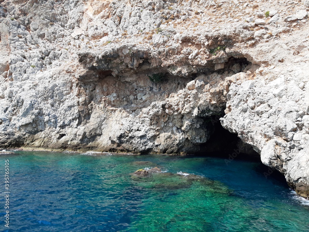 Rock cave by the sea, beautiful sea water, nature