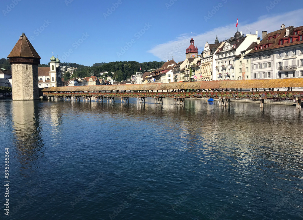 Historic city center of Lucerne with famous Chapel Bridge on Reuss River in Switzerland