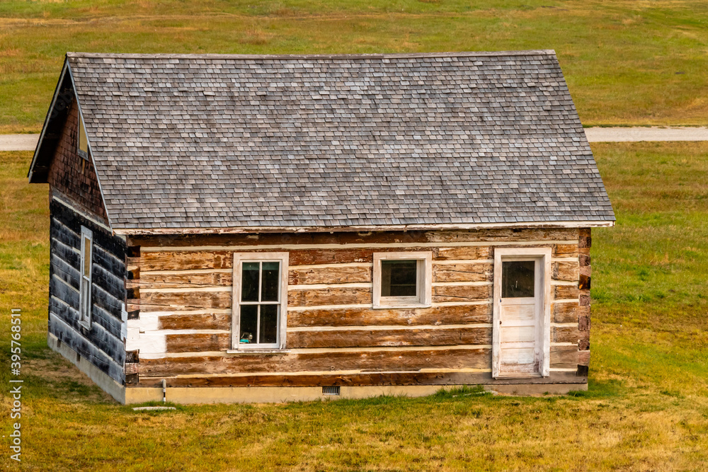Rustic farm buildings and equipment. Bar U Ranch National Historic Site, Alberta, Canada