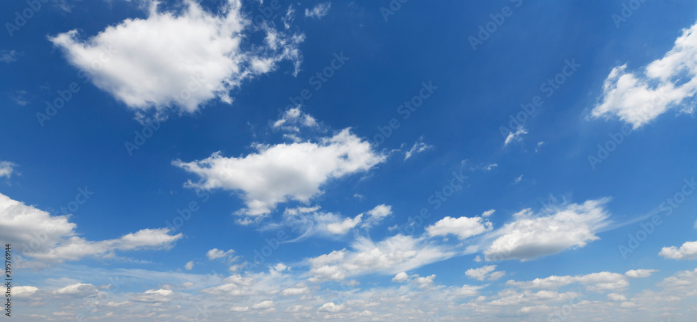 White clouds against blue sky background White clouds against blue sky background