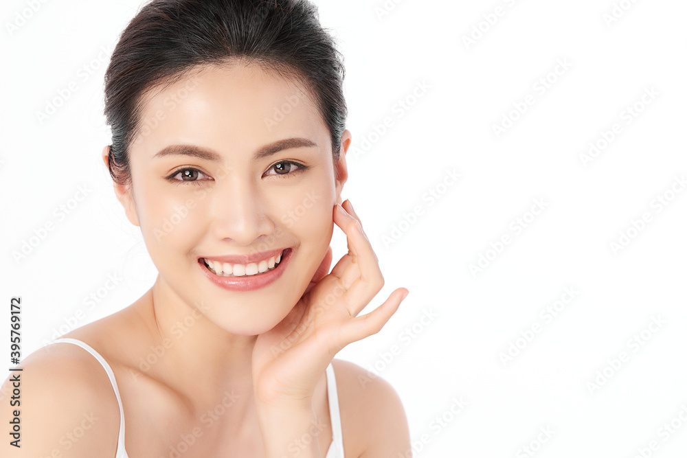 Beautiful young asian woman with clean fresh skin on white background, Face care, Facial treatment, Cosmetology, beauty and spa, Asian women portrait Beautiful young asian woman with clean fresh skin on white background, Face care, Facial treatment, Cosmetology, beauty and spa, Asian women portrait