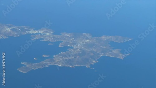 Flying over the Greek Islands. Passenger airplane flying over the Greek Islands, Aegean Sea. Aerial footage. photo