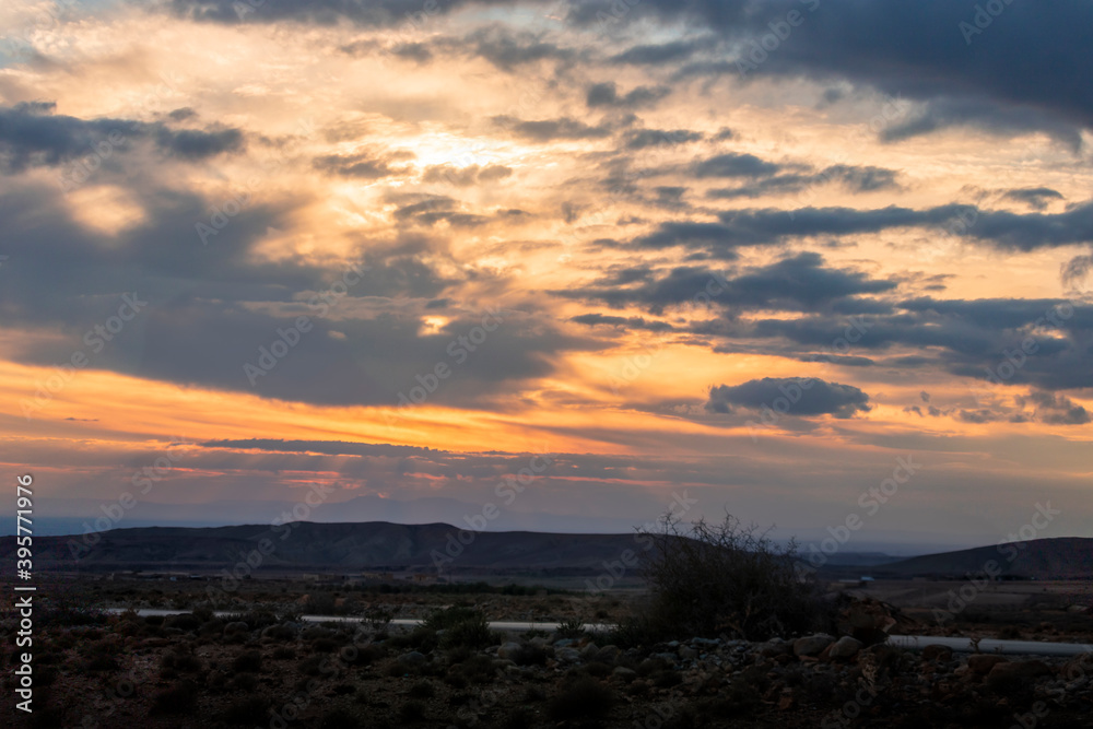 landscape in algeria and sunset sky with clouds . Beautiful moment the miracle of nature landscape in algeria and sunset sky with clouds . Beautiful moment the miracle of nature