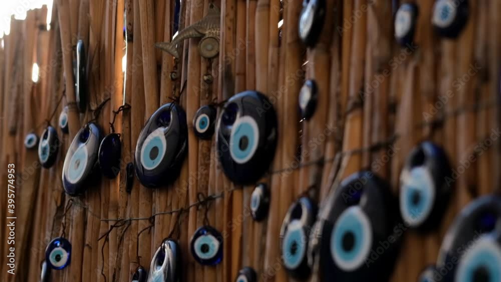 Blue Evil Eye Charms on a Tree in Cappadocia. Amulet from the evil eye, protection of the house, superstition.