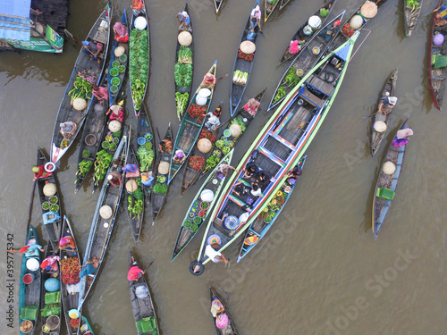  Banjarmasin Indonesia November 27, 2020 : Famous floating market in Indonesia, Lok Baintan floating market, tourists visiting by boat. Aerial Traditional Floating Market in Indonesia