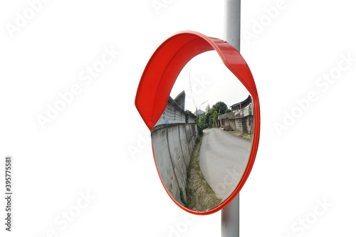 Картината върху платно The traffic curve mirror, convex mirror on the road for safety isolated on white background with clipping path
