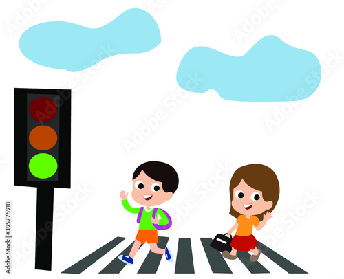 Flat design school children crossing the road at a green light photo