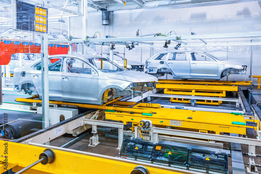 Assembling cars on conveyor line