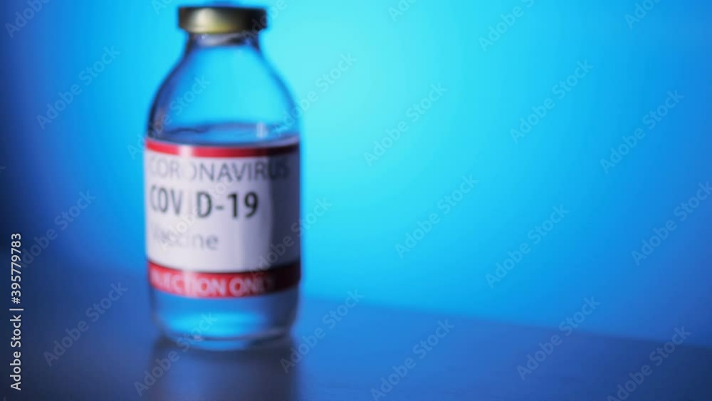 herd immunity - steady cam on bottle of anti covid vaccine - blurred
herd immunity - steady cam on bottle of anti covid vaccine - blurred