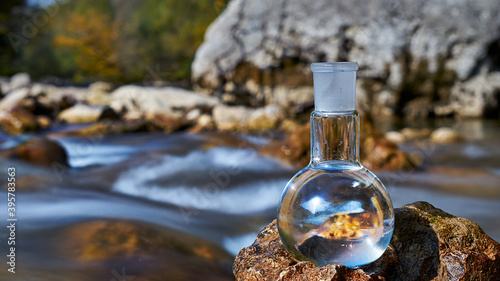 Clean drinking water. Flask with water.