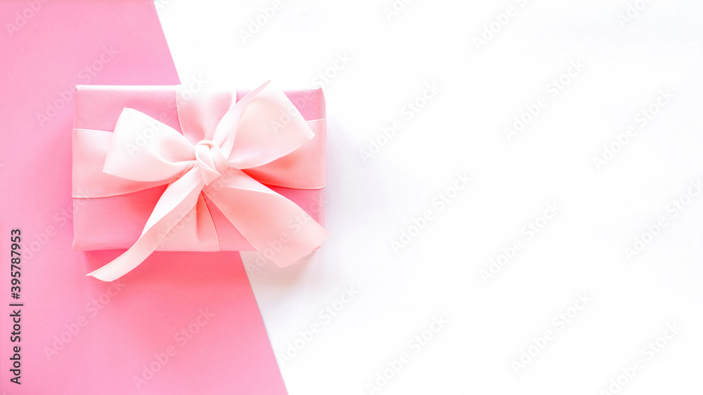 A gift box on two-color background