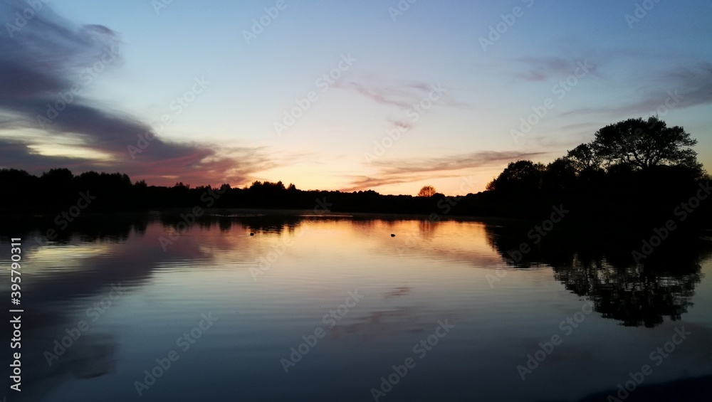 sunset reflected on lake 