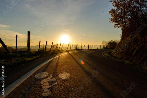 Sunset on the road with bike floor marking - Lyon France