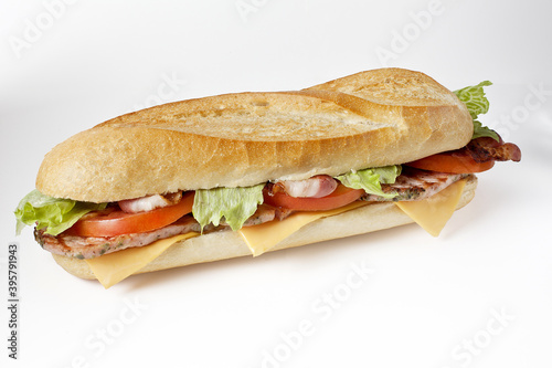 Isolated shot of pork and vegetable sandwich on a white background photo
