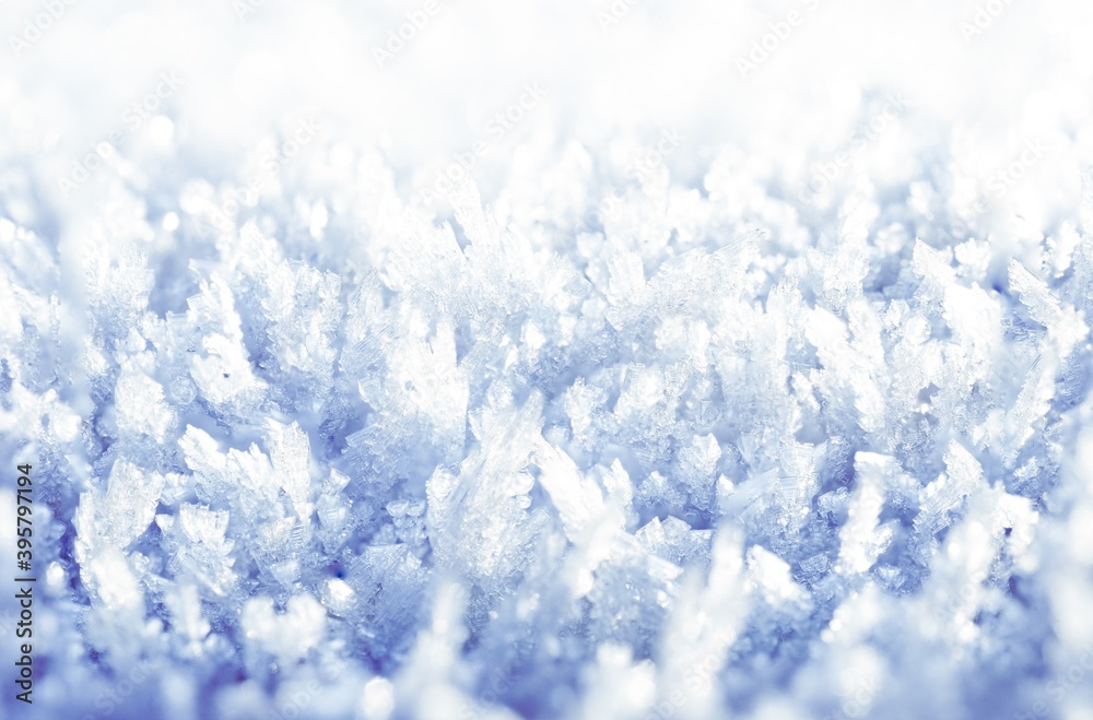 White hoarfrost crystals on flat surface closeup view	

