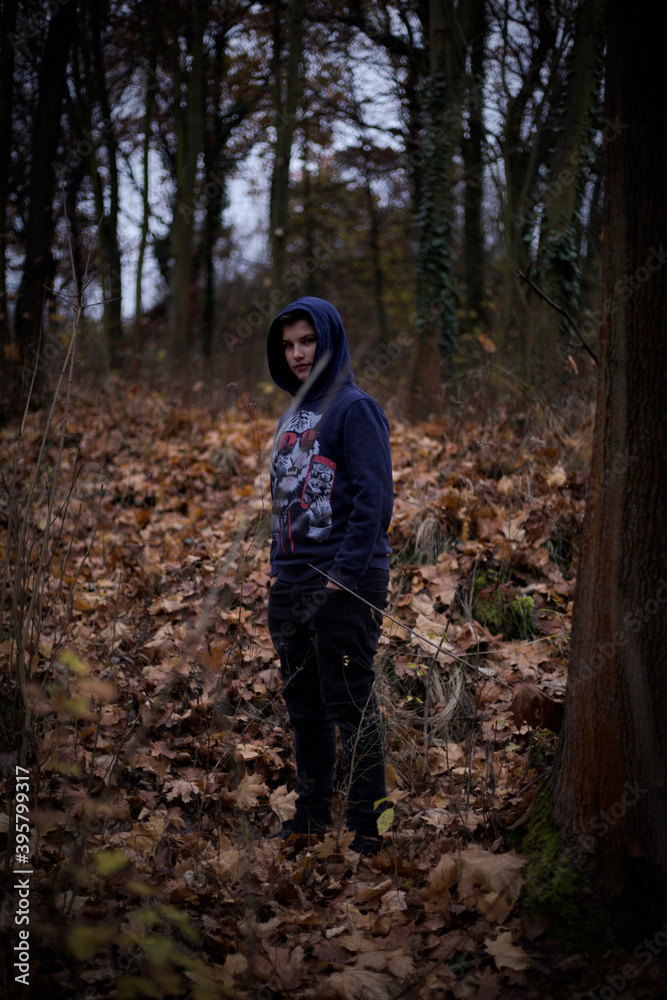 Naklejka premium A nice boy posing in wild Nature 