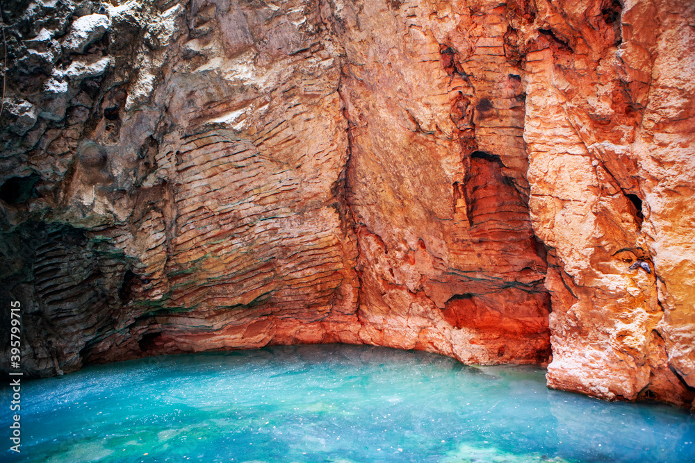 Turquoise-green lake in the Proval cave. Pyatigorsk. Stavropol region. Russia Turquoise-green lake in the Proval cave. Pyatigorsk. Stavropol region. Russia