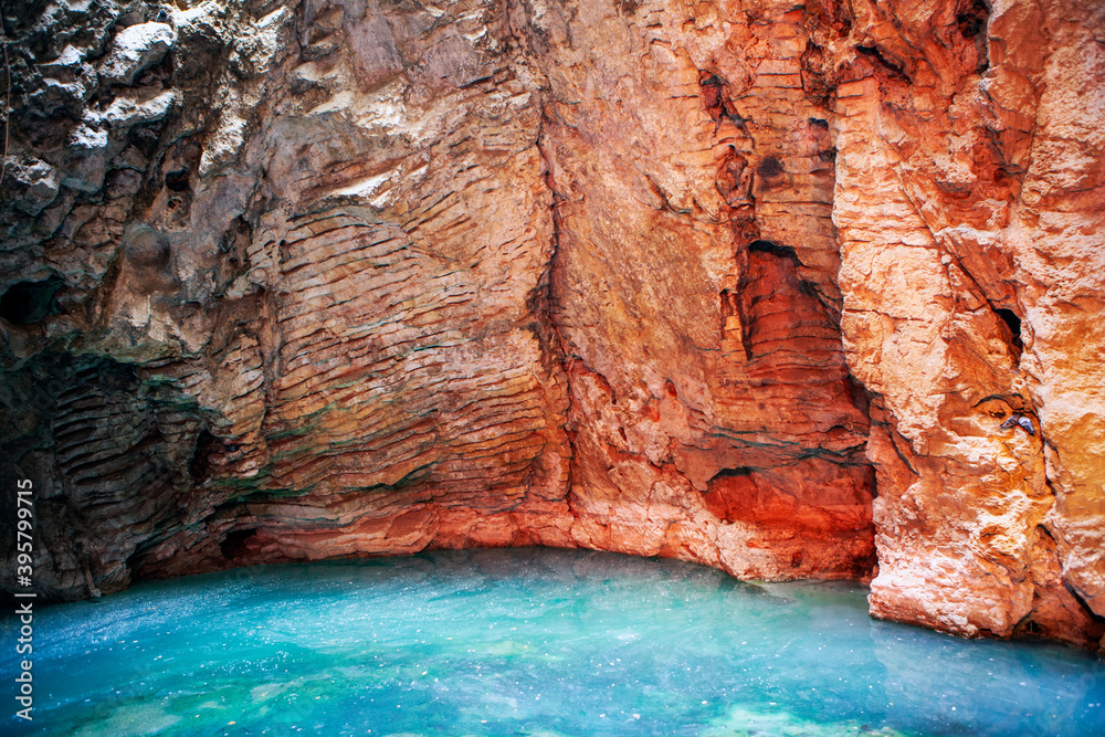 Turquoise-green lake in the Proval cave. Pyatigorsk. Stavropol region. Russia