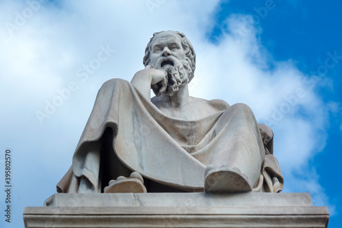 Socrates, one of the greatest philosophers and thinkers of manking, lived and teached in ancient Athens. His statue is at the Academy of Athens, in Greece, Europe.  photo