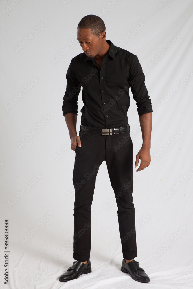 Handsome Black man looking thoughtful Handsome Black man looking thoughtful