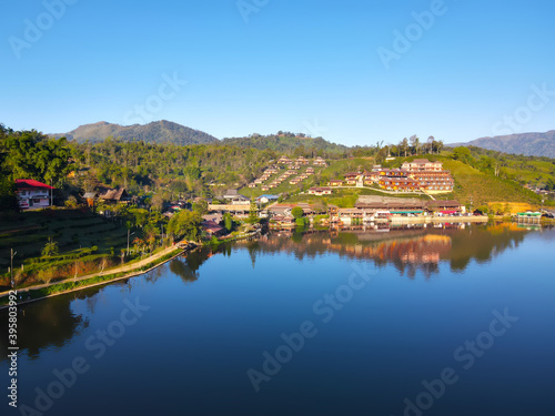 erial view of "Ban Rak Thai village" in the morning blue sky beside beautiful lake, a Village of Chinese settlement is famous travel destination in Mae Hong Son province, Amazing northern Thailand