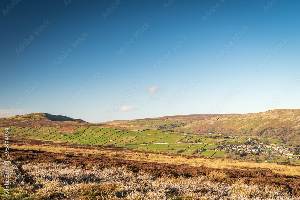 A winter HDR image of Reeth in Swaledale with surrounding pasture and drystone walls aplenty. Yorkshire Dales National Park, England.