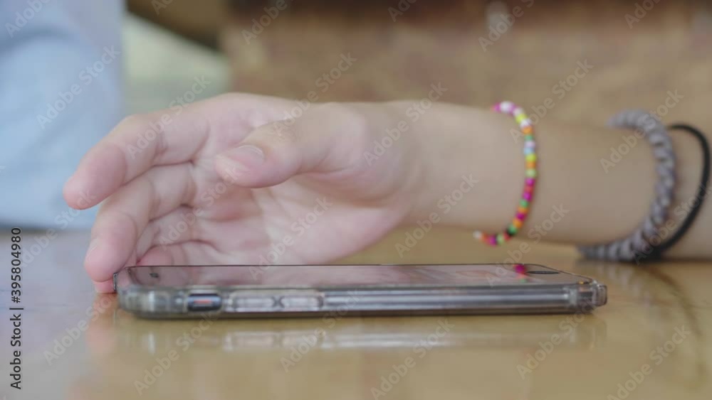 close up of Woman's hand Use the phone close up of Woman's hand Use the phone