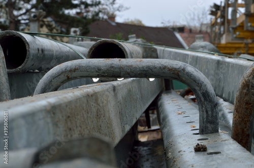 iron structures at a construction site. rain