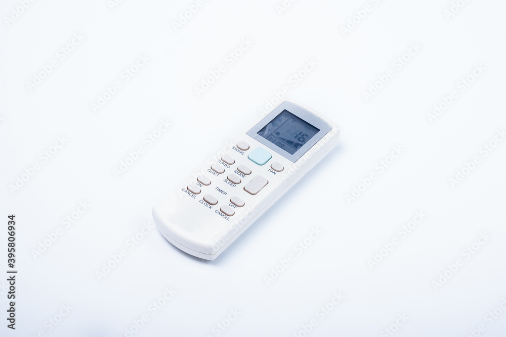 The white color of air-cond remote control. Isolated on white background The white color of air-cond remote control. Isolated on white background