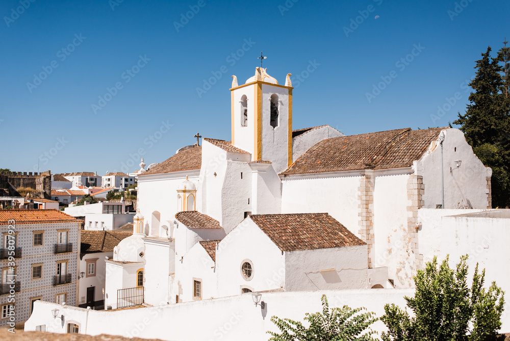 Views from the old castle of Tavira, southern Portugal, of the Santiago Church, a medieval church located in the old area. Very close to Santa Maria do Castelo.