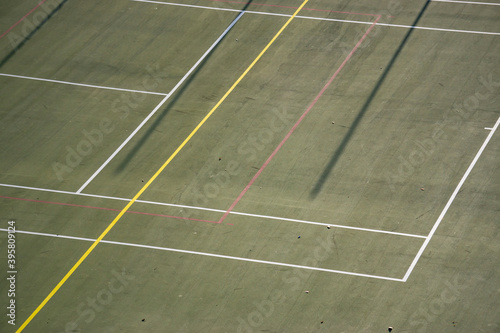 outdoor sports court with grass and lines