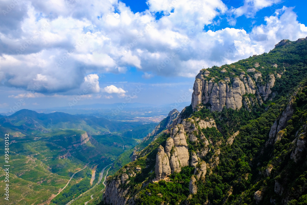 Picturesque view from Montserrat mountain to the cliffs and valley, near Santa Maria de Montserrat Benedictine Abbey, Catalonia, Barcelona, Spain