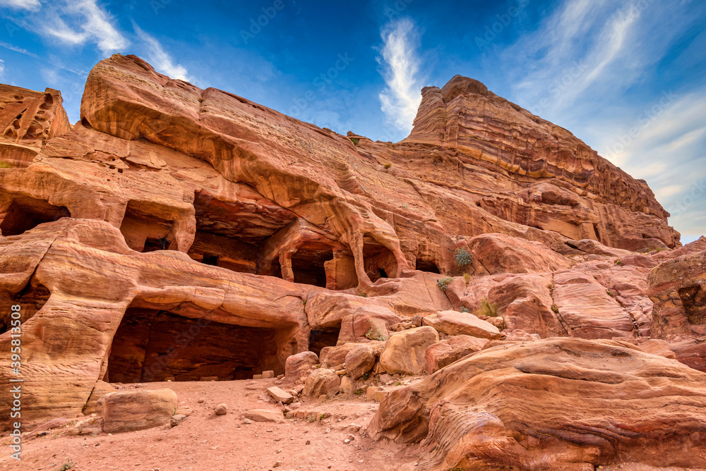Petra,Jordan - October 23,2015: The rocky city of Petra. Red rocks and the rooms cut in them Petra,Jordan - October 23,2015: The rocky city of Petra. Red rocks and the rooms cut in them