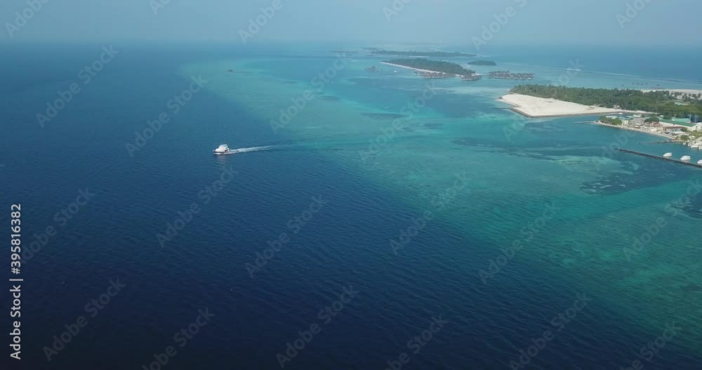 Aerial view of a boat near Huraa, North Male Atoll, Maldives, Indian Ocean . High quality 4k footage Aerial view of a boat near Huraa, North Male Atoll, Maldives, Indian Ocean . High quality 4k footage