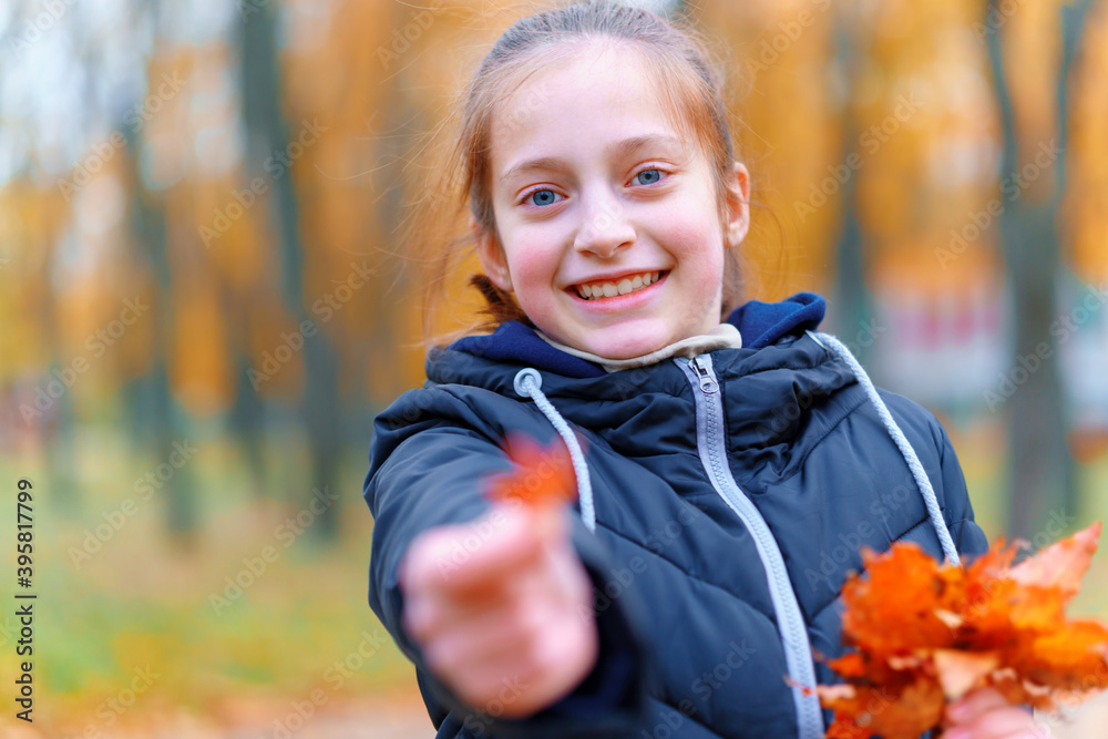 a girl posing and enjoying autumn in city park, beautiful nature with yellow leaves a girl posing and enjoying autumn in city park, beautiful nature with yellow leaves