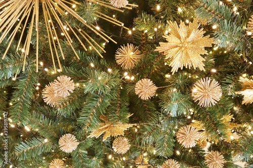Christmas tree with new year decorations. New Year celebration. Selective soft focus. Background for postcards