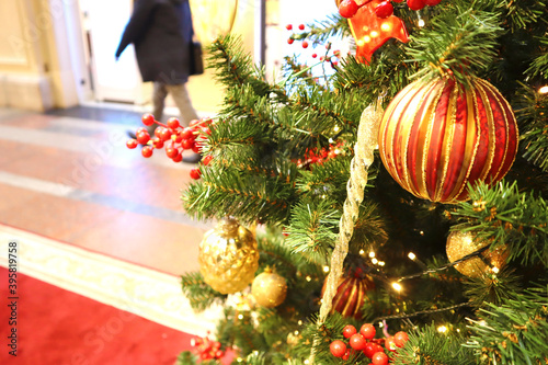 Christmas tree with new year decorations. New Year celebration. Selective soft focus. Background for postcards